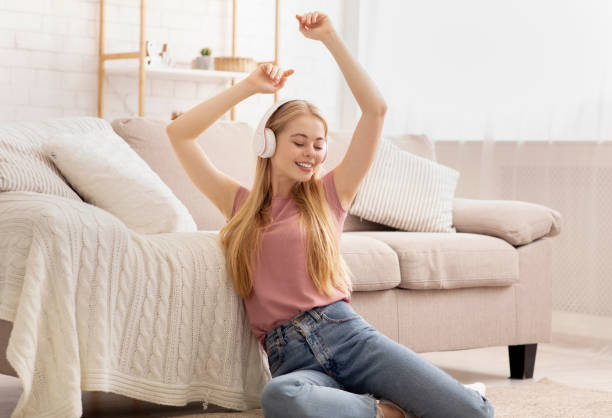 istock Girl Listening to Music, Using Wireless Headset 1202272051