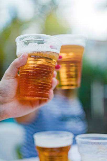istock Friends enjoying drinking beer in the backyard. 1202273108