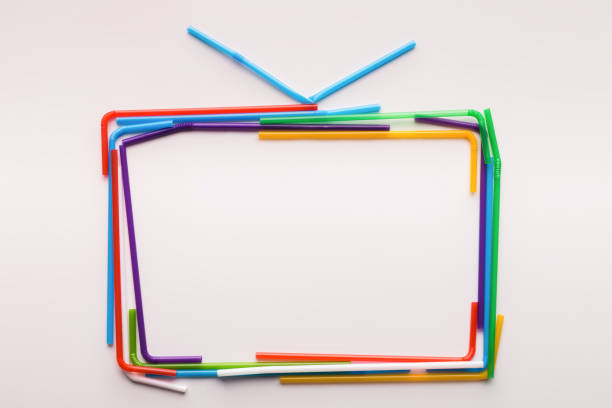 istock Colored TV set of plastic straws with copy space inside 1202273259