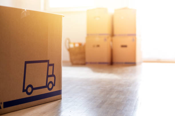 istock Move. Cardboard, boxes for moving into a new, clean and bright home 1202275034