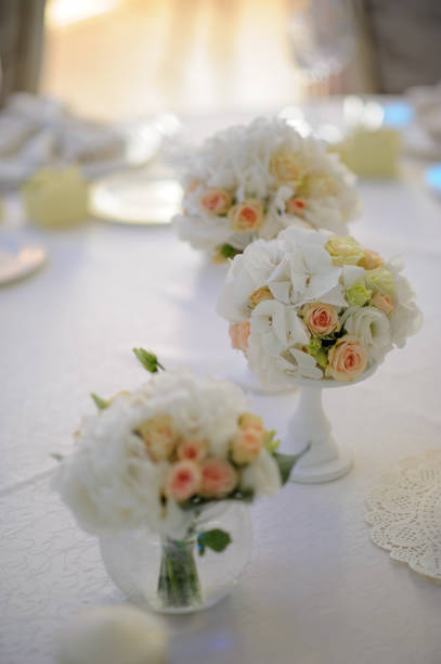 istock Beautiful flowers on table in wedding day 1202279135