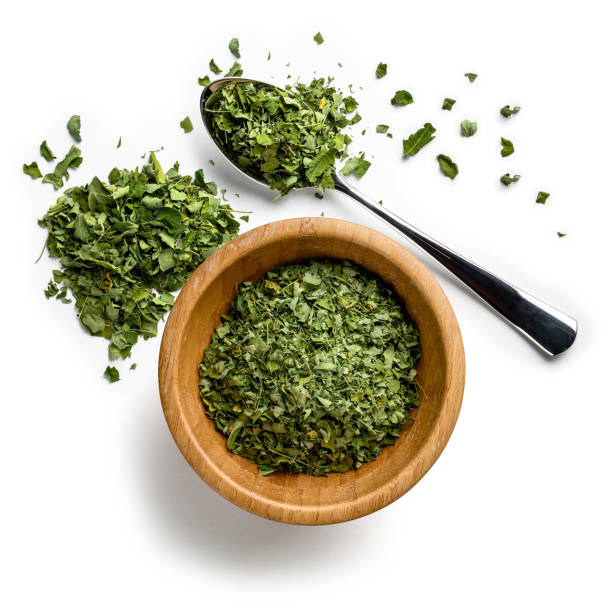 istock Dried Moringa on a white background. The view from the top 1202281286