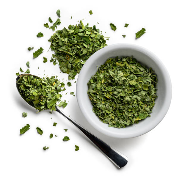 istock Dried Moringa on a white background. The view from the top 1202281289