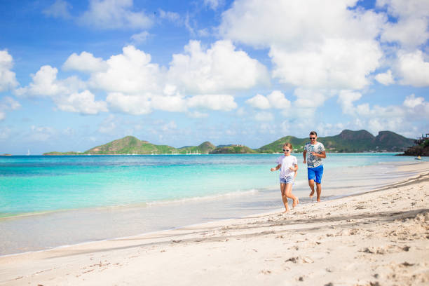istock Father and kids enjoying beach summer vacation 1202283580