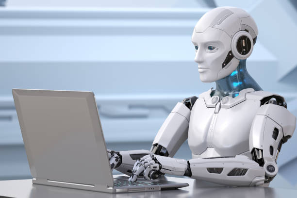 istock The robot works with a laptop 1202283674