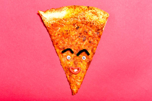 istock Slice of pizza with a funny face 1202283713