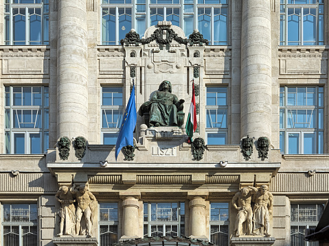 Budapest, Hungary - December 5, 2016: Franz Liszt statue on the facade of the Franz Liszt Academy of Music. The statue by sculptor Alajos Strobl (1856-1926) was erected in 1907 together with the building of Academy.