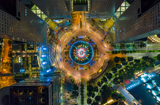 Top view of the Singapore landmark financial business district with skyscraper. Fountain of Wealth at Suntec city in Singapore at night