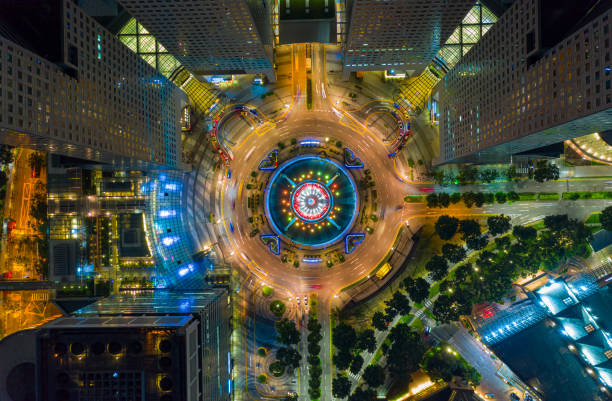 Top view of the Singapore landmark financial business district with skyscraper. Fountain of Wealth at Suntec city in Singapore at night Top view of the Singapore landmark financial business district with skyscraper. Fountain of Wealth at Suntec city in Singapore at night singapore photos stock pictures, royalty-free photos & images