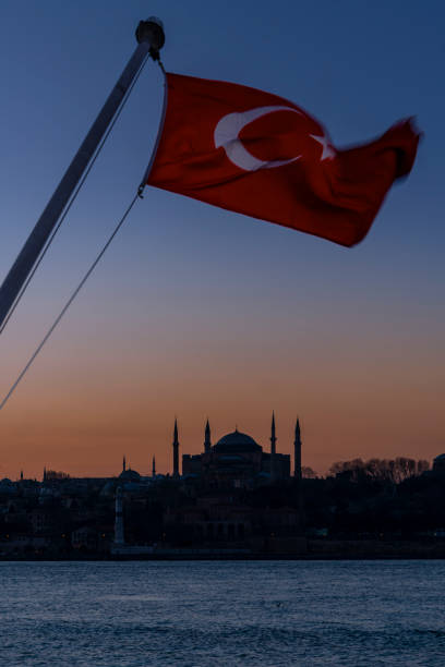 istock Turkish flag and Sunset in Bosphorus of Istanbul. 1202290190