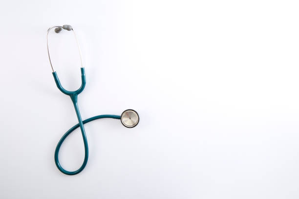 top view stethoscope doctor on desk white and space for text