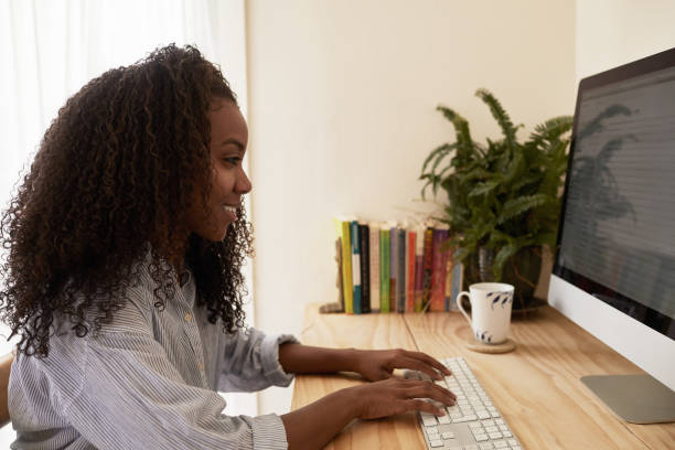 istock Smiling young entrepreneur working on her business from home 1202291669