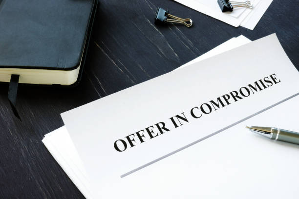 istock IRS Offer in Compromise OIC agreement and pen. 1202291670