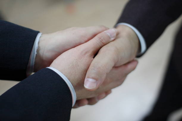 istock handshake two person  business contract peace 1202293661
