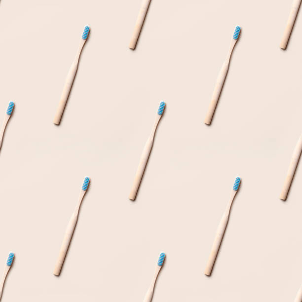istock Trendy seamless pattern of eco-friendly biodegradable and recyclable bamboo toothbrushes 1202293850