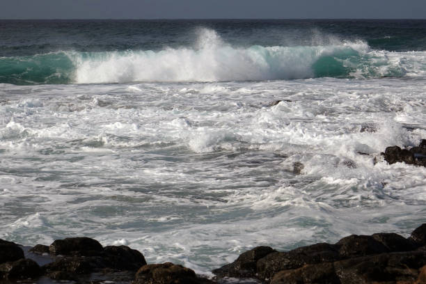 istock Big waves splashing on the coast 1202295380