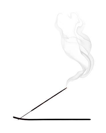 Incienso, silueta con humo sobre fondo blanco photo