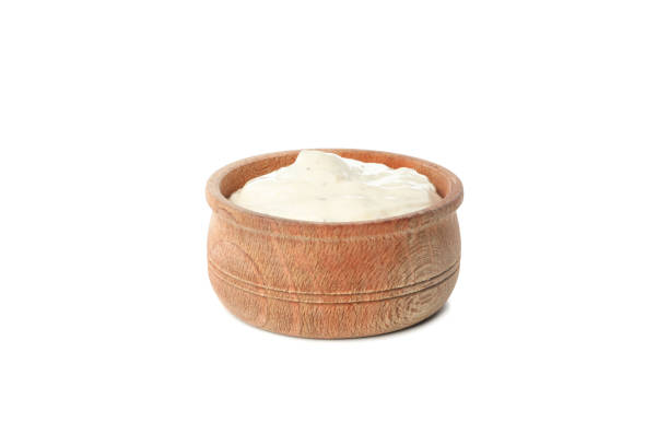 istock Wooden bowl with sauce isolated on white background 1202296407