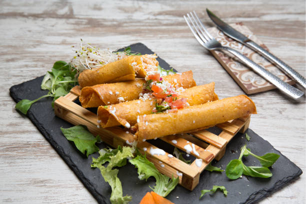 istock Typical Mexican food chicken flutes. 1202296458