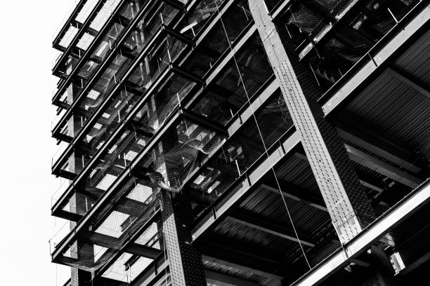 istock Black and white photo, Structure of steel for building construction. 1202296573