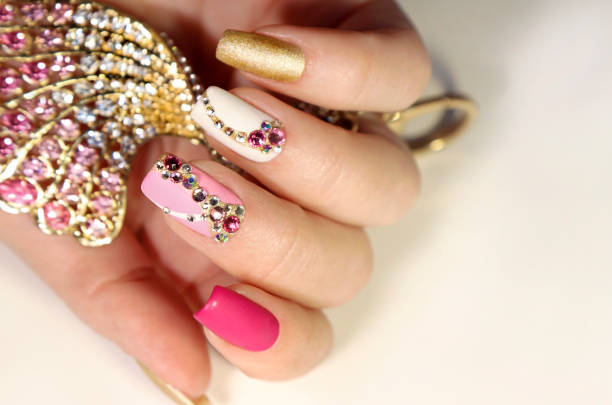 istock Nail art with various shaped rhinestones 1202296917