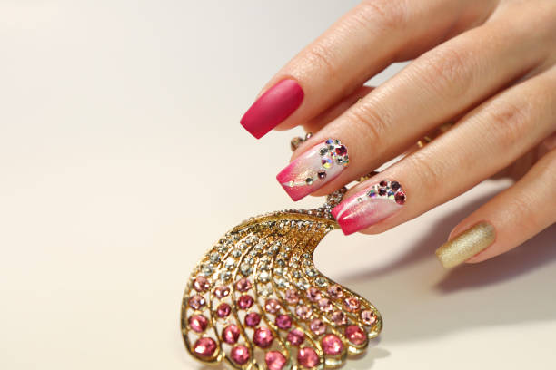 istock Nail art with various shaped rhinestones 1202296918