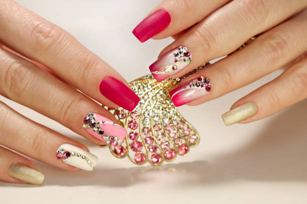 istock Nail art with various shaped rhinestones 1202296928