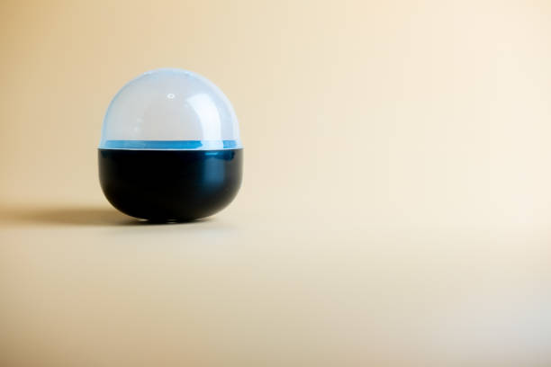 istock Transparent egg plastic toy for put toy inside on yellow background. 1202298337