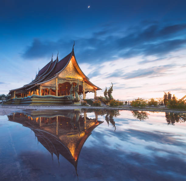 Sirindhorn Wararam Phu Prao is public Temple (Wat Phu Prao) at evening,a glow of the sculpture of the Kalpapruek, which is attached to the wall behind the church.It will appear green glow in the night