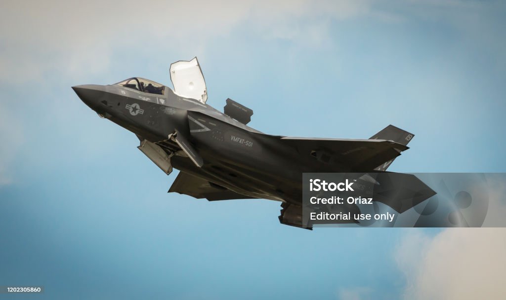 The F-35B Lightning II in full hover HAMPSHIRE, UK - JULY, 2016: The F-35B Lightning II in full hover. July 16, 2016 Hampshire, England F-35 Fighter Stock Photo