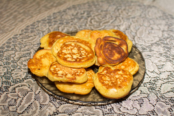 istock Wheat flour pancakes lie on a glass plate 1202306025