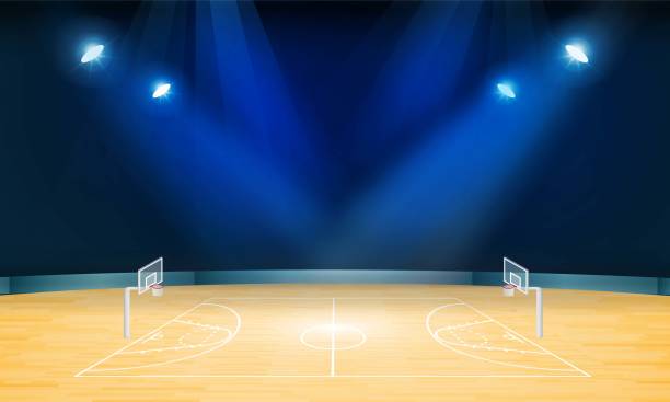istock Basketball arena field with bright stadium lights design. Vector illumination 1202307490