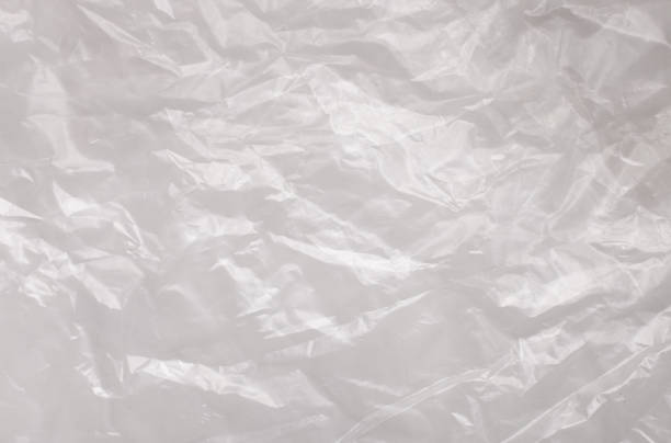 istock Background texture of a polyethylene transparent film on a white background 1202307609
