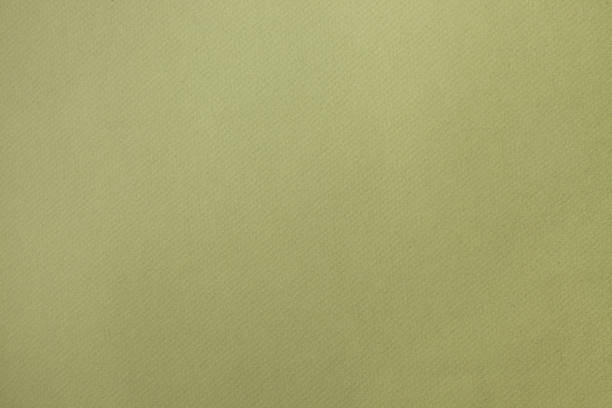 istock Texture of light green uneven watercolor paper 1202307877