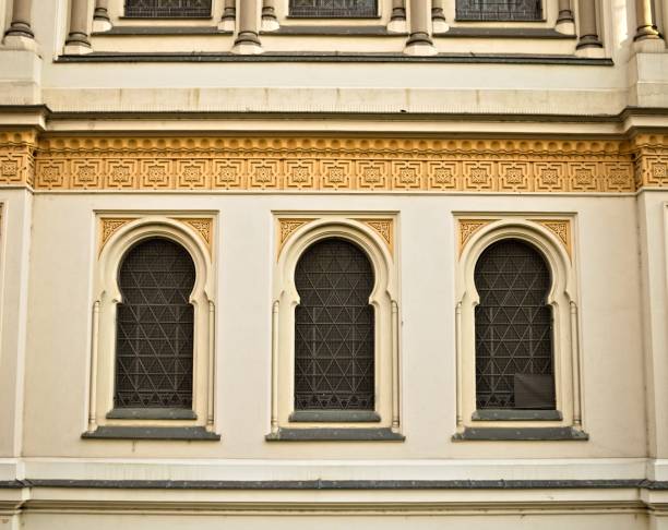 Three oriental windows of a Jewish synagogue with an islamic architecture (Prague, Czech Republic, Europe)