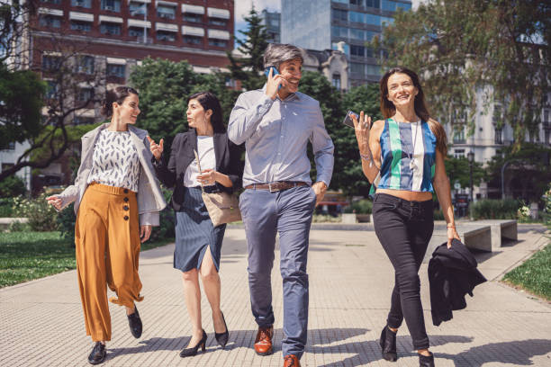 istock Carefree modern business people enjoying beautiful day after work 1202312664