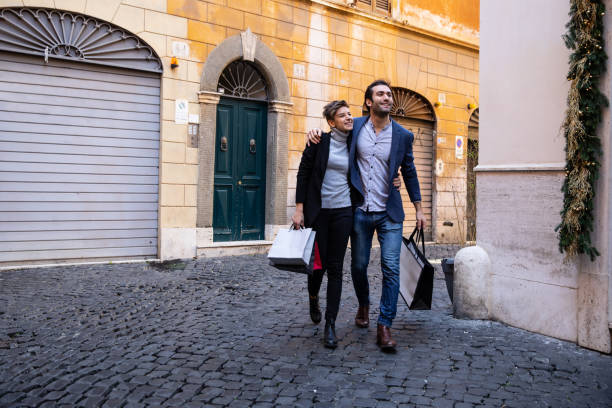 istock Man shopping in central Rome 1202315559
