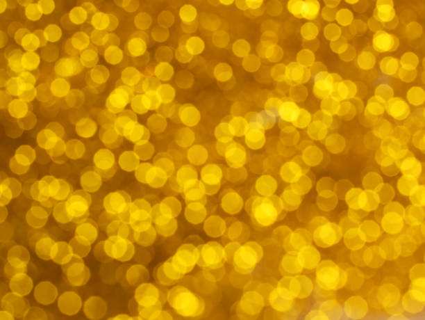 istock Abstract of golden bokeh light background 1202317108