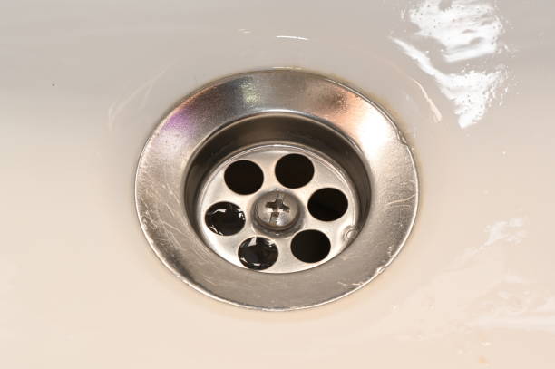 istock Close up to sink drain 1202318959