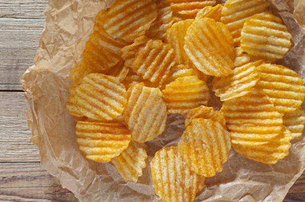 istock Tasty potato chips 1202319296