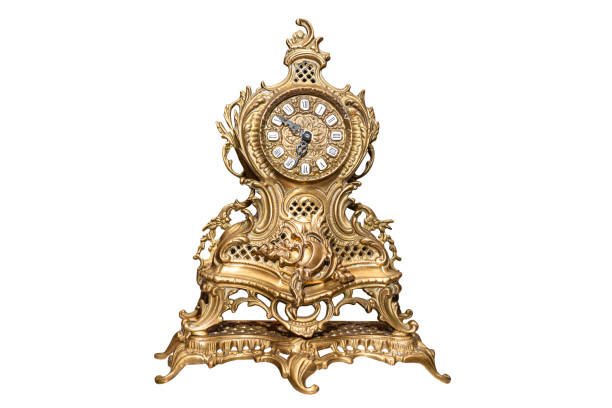istock A large, standing clock made of brass with ornaments, isolated on a white background with a clipping path. 1202320839