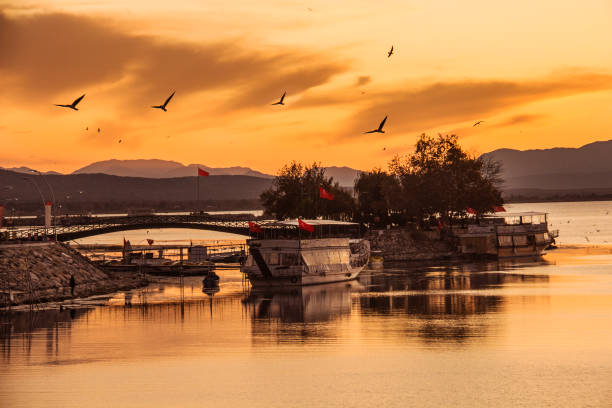 Beysehir Lake and Sunset. Atmospheric Mood, Beach, Beauty, Beauty In Nature, Cloud - Sky, sunset, lake, Beysehir lake, Konya,Birds konya stock pictures, royalty-free photos & images