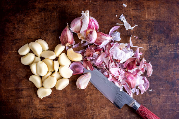 istock Peeled garlic for use in garlic oil 1202327067