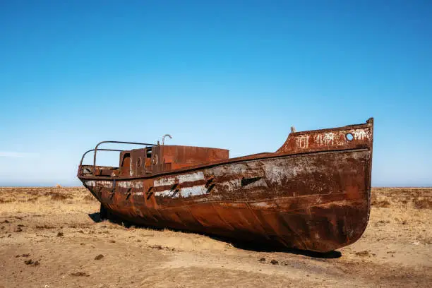 Abandoned boat in desert close to Akbasty in Aral sea or Aral lake, Kazakhstan