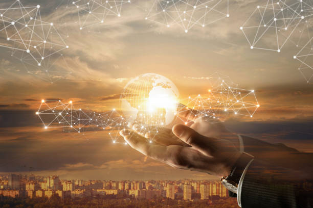 istock Hands of a businessman support a global network . 1202332337