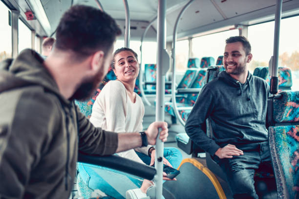 istock Friends Enjoying Fun Conversation During Bus Travels 1202338922