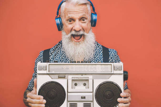 Retouch plads Settle Happy Senior Man Listening To Music With Boombox And Headphones Outdoor  Crazy Hipster Male Having Fun With Vintage Stereo Concept Of Elderly People  Lifestyle Stock Photo - Download Image Now - iStock