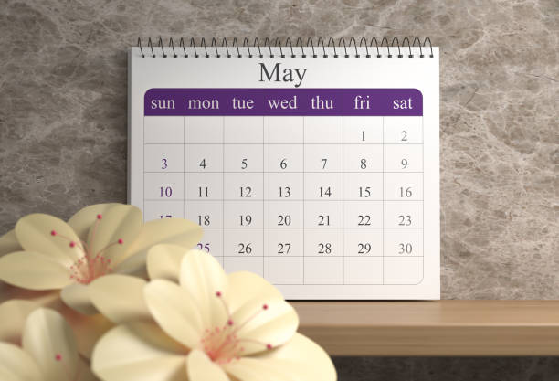 istock 2020 calendar with yellow flowers 1202342578