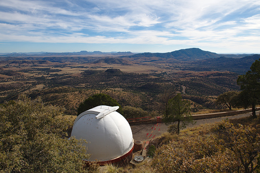 The Astronomer's Lodge, the building housing the Harlan J. Smith Telescope, is located in the Fort Davis Mountains.