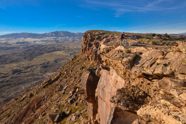 istock Mountain Biker Riding The Southwest Desert on a Bluff 1202347222